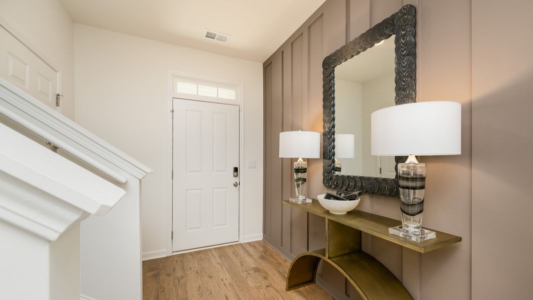 Furnished interior in a model home at Sherwood Manor in College Park (Image 3).