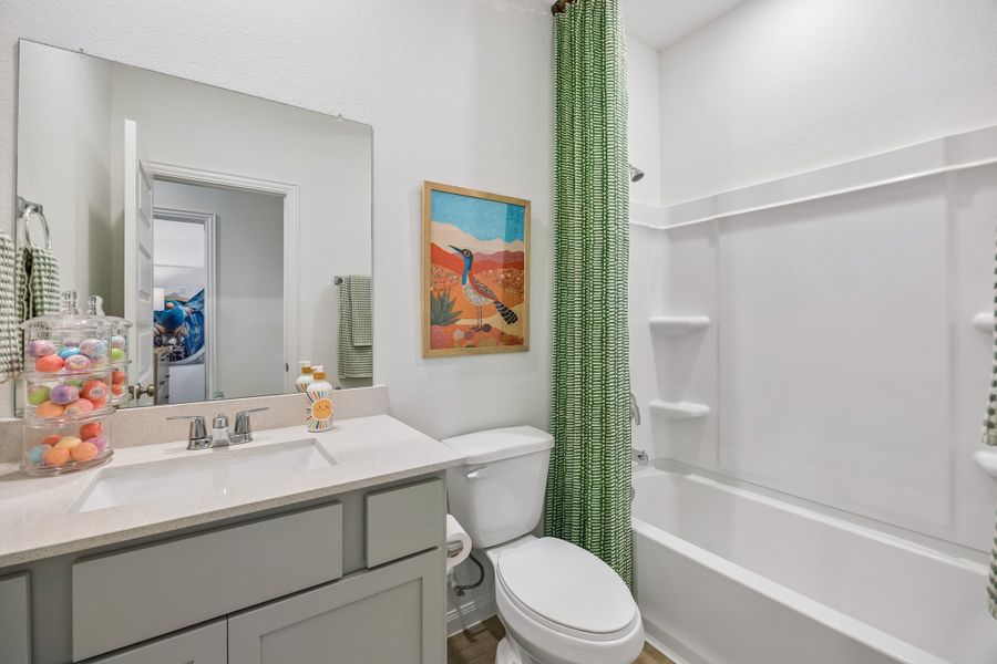 Furnished interior in a model home at Sofi Lakes in Katy (Image 23).