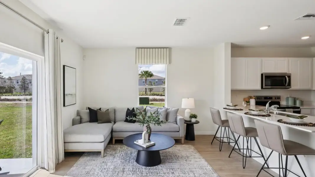 Furnished interior in a model home at Skyway Point in Tampa (Image 6).