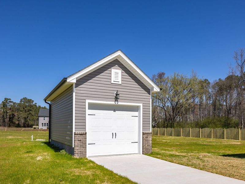 Front exterior of a home in the Wellers Knoll community, located in Lillington, NC (Image 11).
