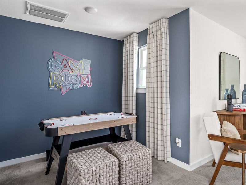 Furnished interior in a model home at Woods Crossing in Gallatin (Image 29).