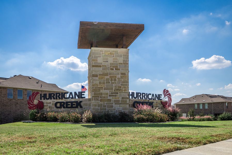 Entrance to the The Villages of Hurricane Creek community in Anna, TX, featuring signage and landscaping (Image 2). Entrance to the The Villages of Hurricane Creek community in Anna, TX, featuring signage and landscaping (Image 2).