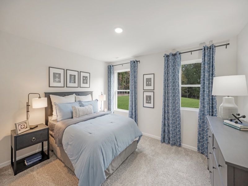 Three secondary upstairs bedrooms make room for the entire family.