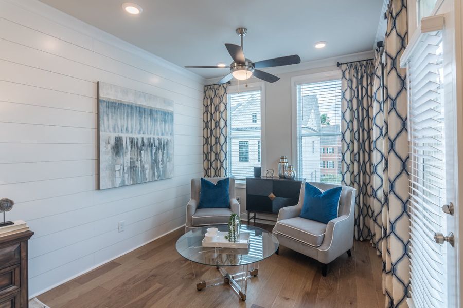 Furnished interior in a model home at Towns on Thompson in Alpharetta (Image 8).