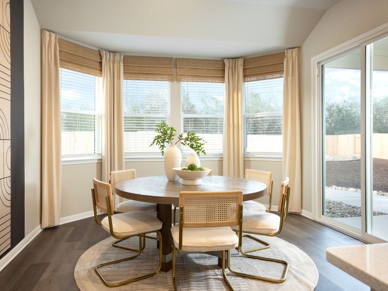 Furnished interior in a model home at Opal Meadows in Kyle (Image 8).