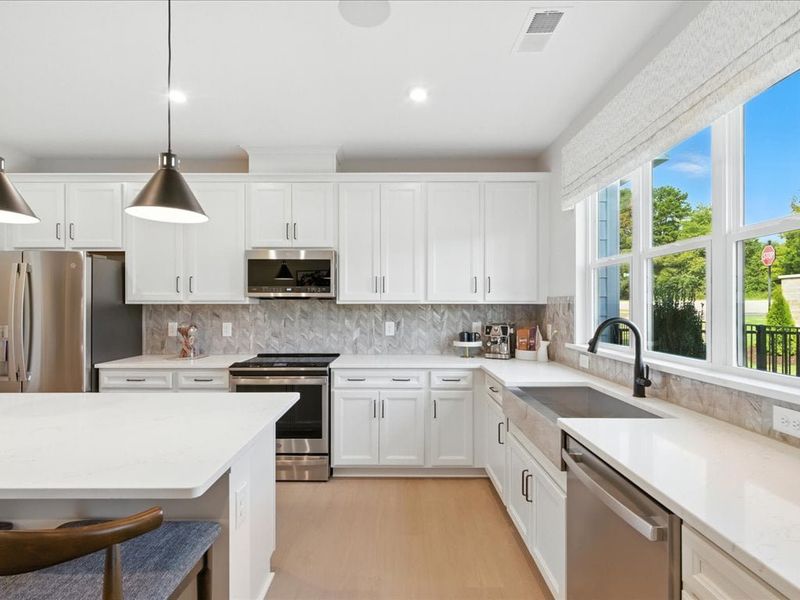 Furnished interior in a model home at Southbridge in Fort Mill (Image 9).