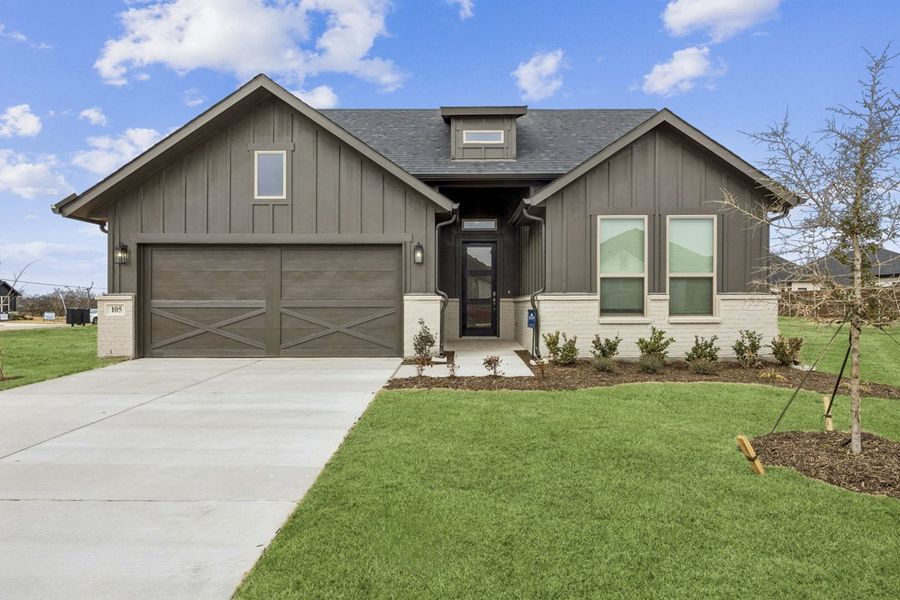 Front exterior of a home in the Hadley Farms community, located in Godley, TX (Image 2). Front exterior of a home in the Hadley Farms community, located in Godley, TX (Image 2).