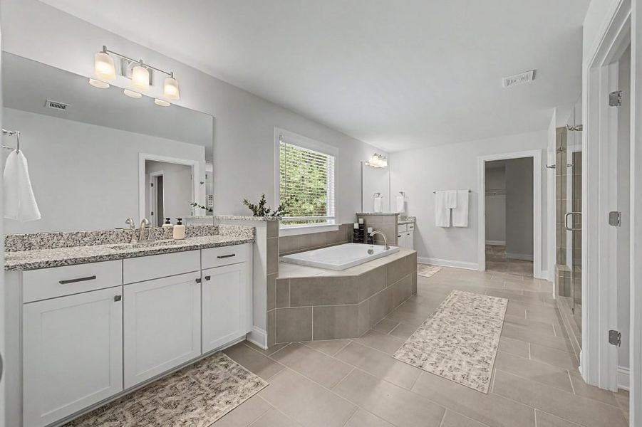 Furnished interior in a model home at The Estates at Hurricane Pointe in Douglasville (Image 31).