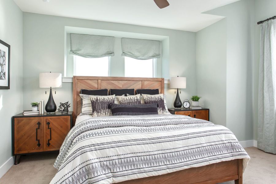 Furnished interior in a model home at Windsong Ranch Townhomes in Prosper (Image 29).