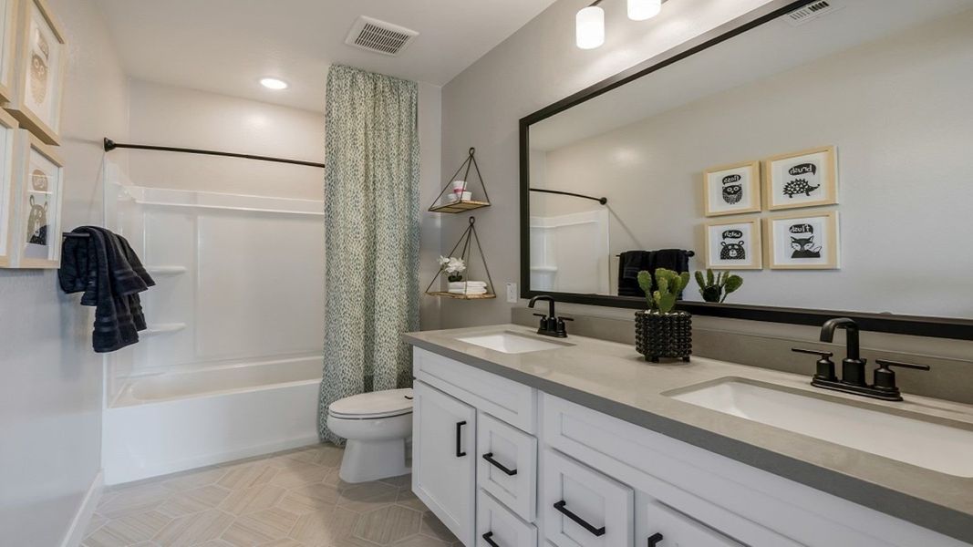 Furnished interior in a model home at Eminence at Alamar in Avondale (Image 17).