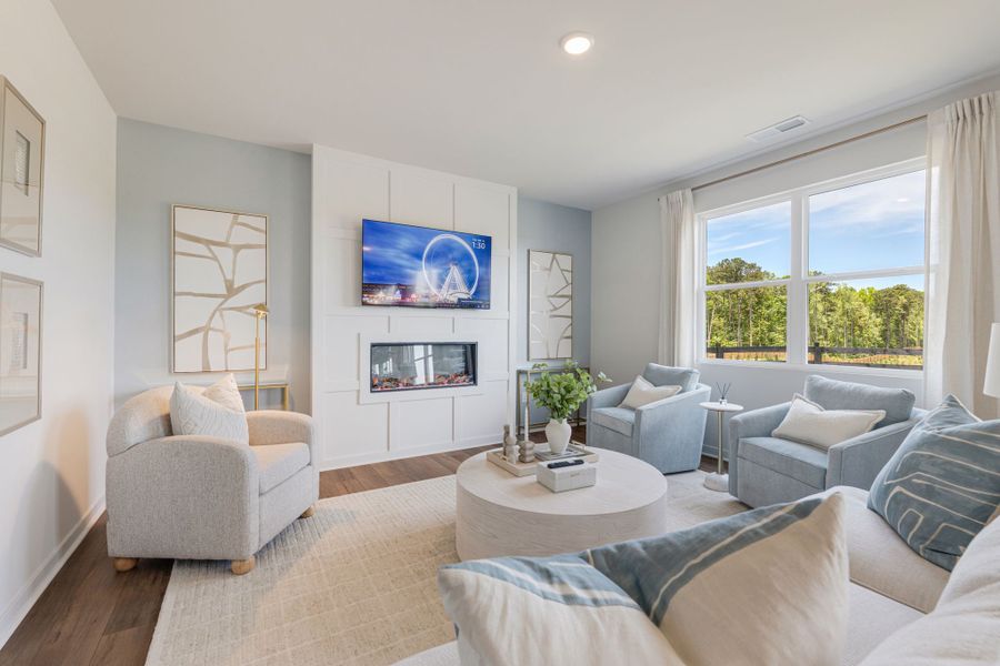 A living room with a large window.