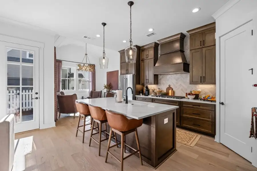 Furnished interior in a model home at The Heritage at Farmer’s Crossing in Ball Ground (Image 7).