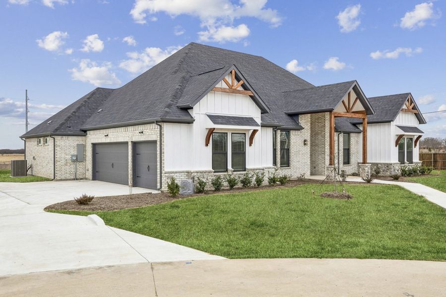 Front exterior of a home in the Bison Meadows community, located in Waxahachie, TX (Image 2).