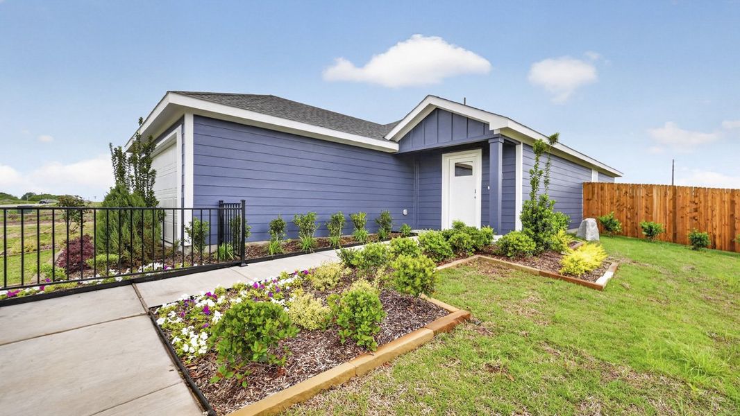 Front exterior of a home in the The Hills of Sherman community, located in Sherman, TX (Image 11).
