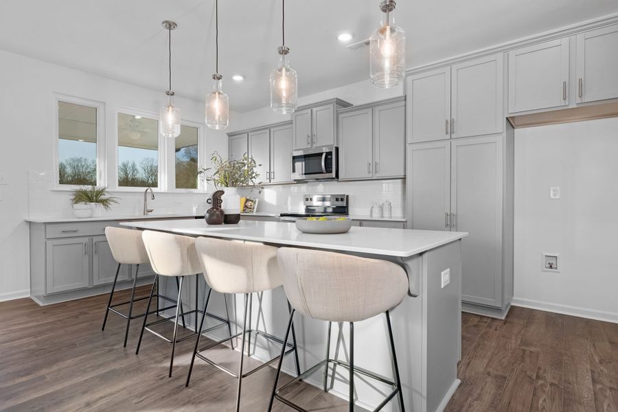 Furnished interior in a model home at Whispering Hills in Locust (Image 3).