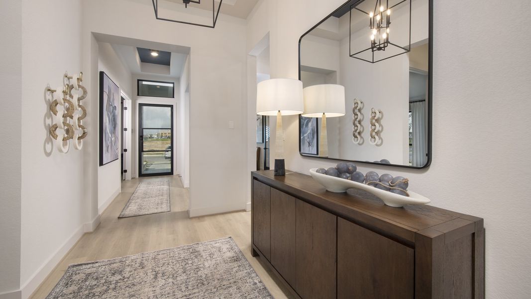 Furnished interior in a model home at Juniper Springs 60' in Lockhart (Image 4).