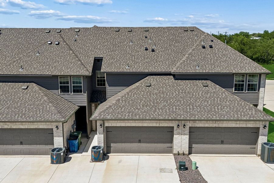 Front exterior of a home in the Sanger Circle – Townhomes community, located in Sanger, TX (Image 33). Front exterior of a home in the Sanger Circle – Townhomes community, located in Sanger, TX (Image 33).