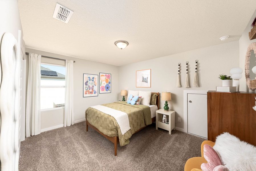 Furnished interior in a model home at Talley Fields in San Antonio (Image 35).