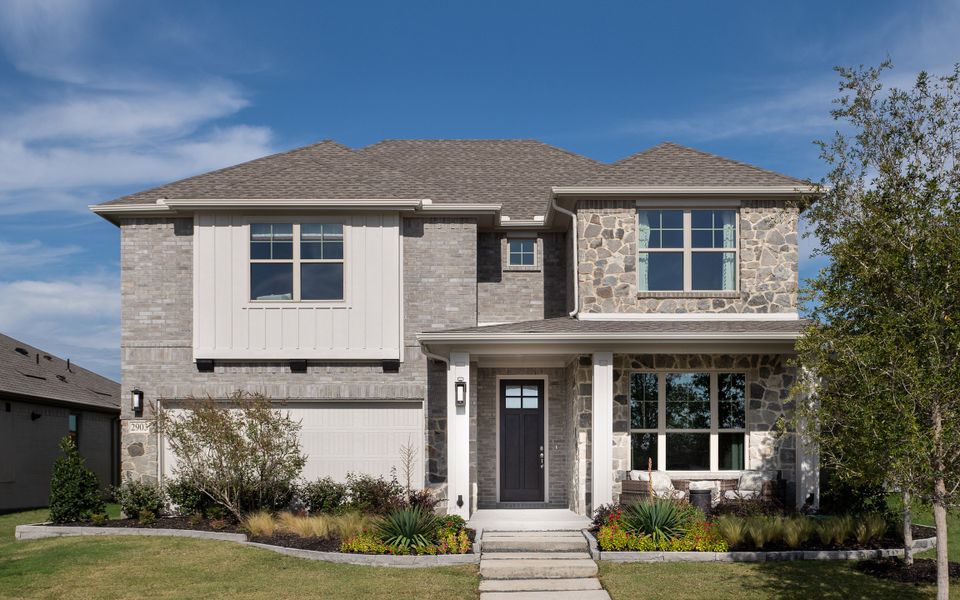 Front exterior of a home in the View at the Reserve 50s community, located in Mansfield, TX (Image 7).