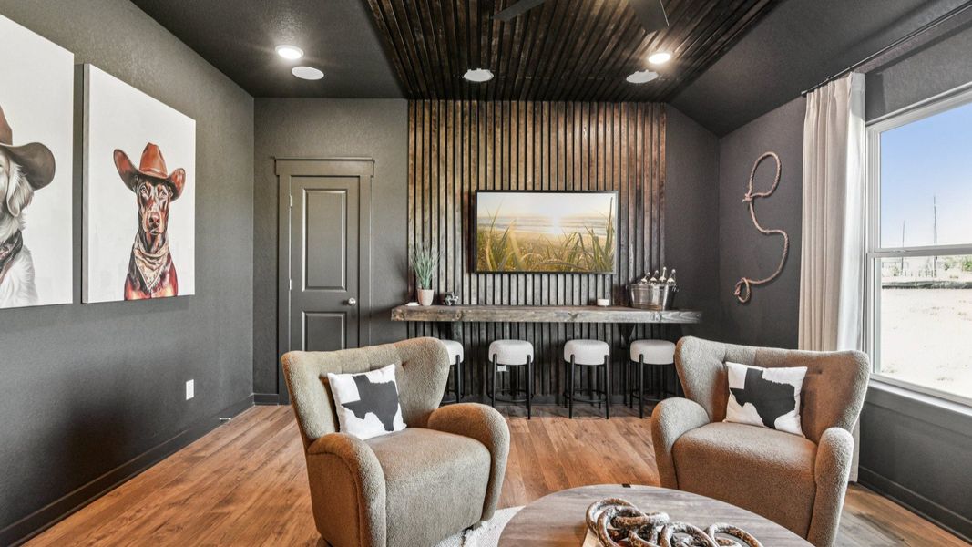 Game Room Area located behind the kitchen, featuring an additional closet and a ceiling fan Game Room Area located behind the kitchen, featuring an additional closet and a ceiling fan