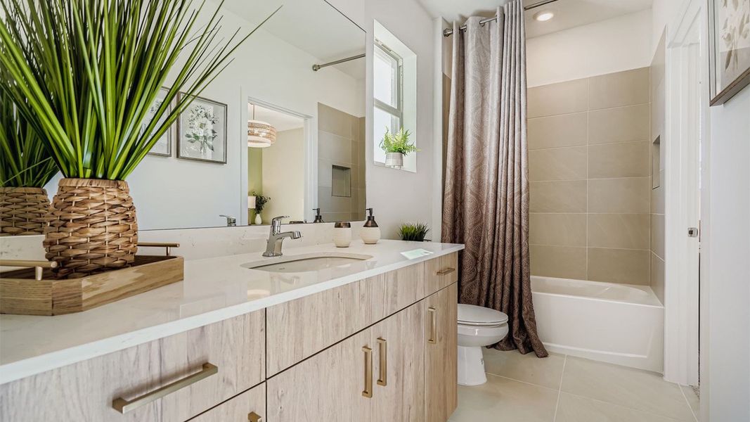 Furnished interior in a model home at Lakeside Landing in Royal Palm Beach (Image 11).