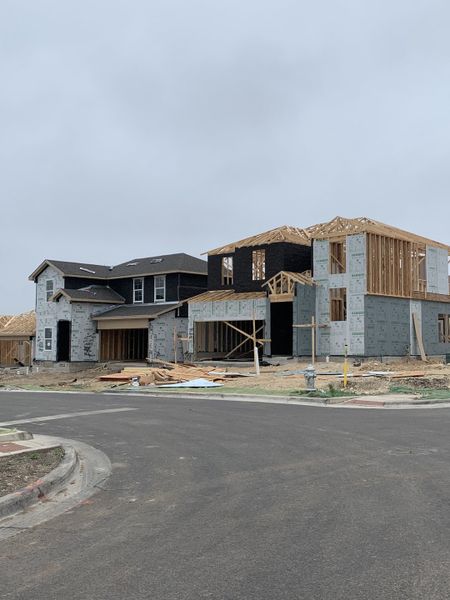 Newly constructed homes in Bar W Ranch by D.R. Horton, Leander, TX, showcase modern architectural designs.