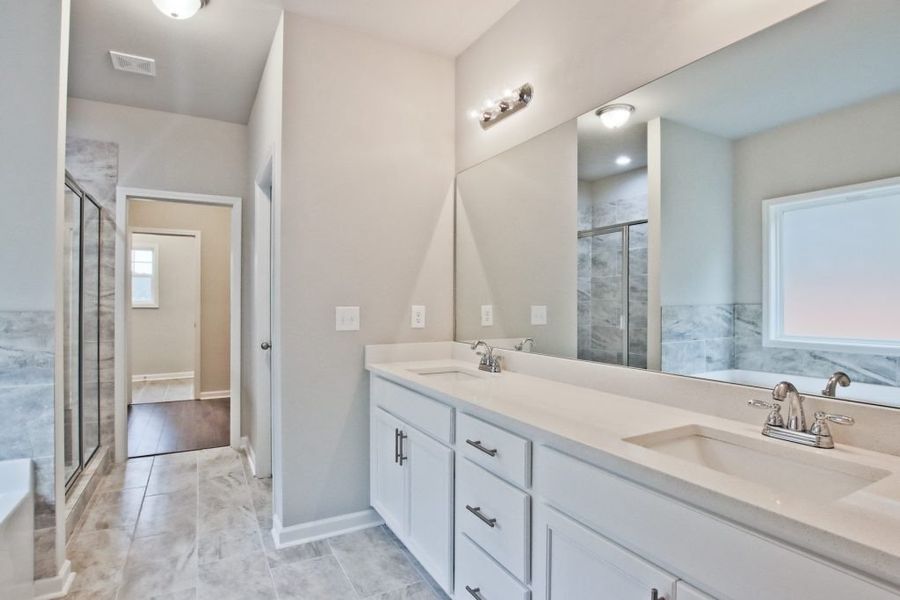 Furnished interior in a model home at Rockwell Farms in Winder (Image 21).