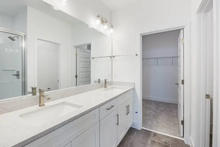 Furnished interior in a model home at Harvest at Ovation - Townhomes in Winter Garden (Image 65).