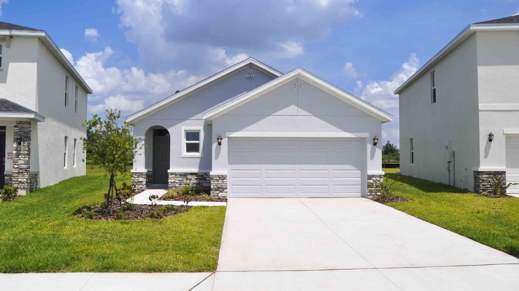 Front exterior of a home in the Oakfield Trails community, located in Parrish, FL (Image 14). Front exterior of a home in the Oakfield Trails community, located in Parrish, FL (Image 14).