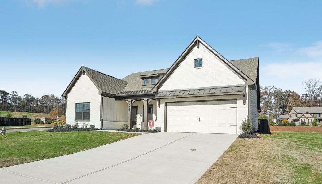 Front exterior of a home in the Ponderosa Farms Reserve community, located in Gainesville, GA (Image 13).