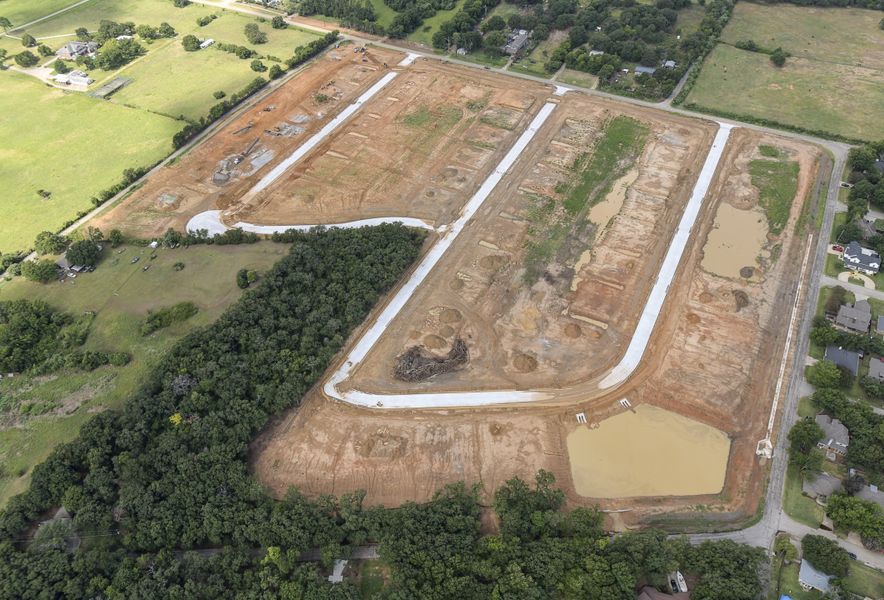 Site preparation and early development at Wild Oaks in Shady Shores, TX (Image 4).