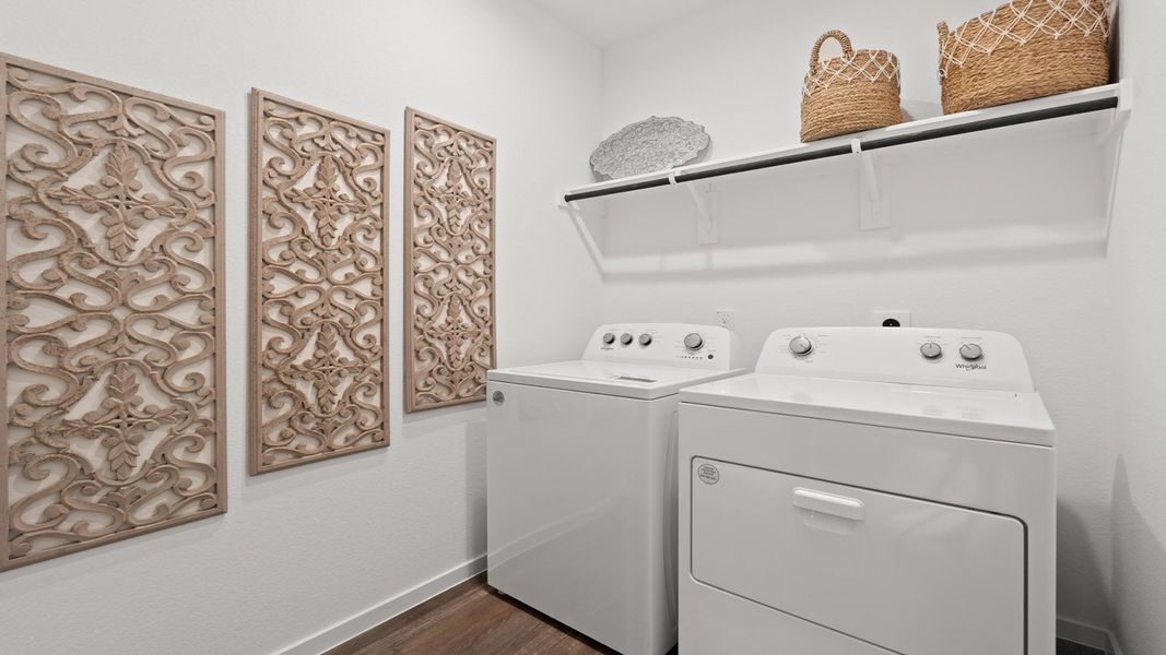 Furnished interior in a model home at Sunterra in Katy (Image 25).