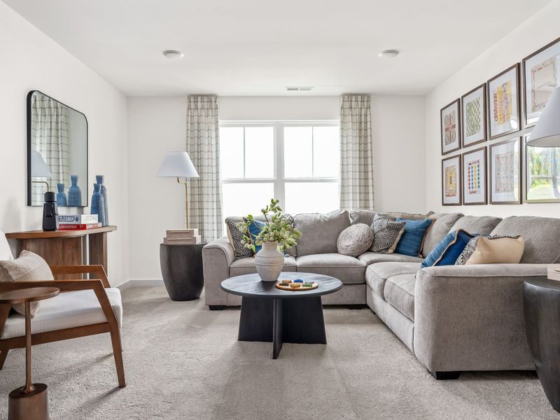 Furnished interior in a model home at Woods Crossing in Gallatin (Image 27).