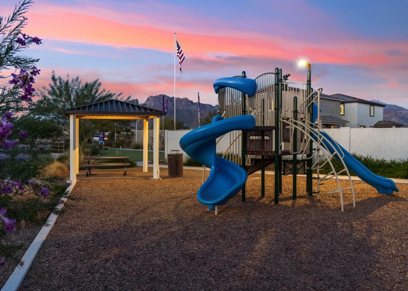A playground with a slide. A playground with a slide.