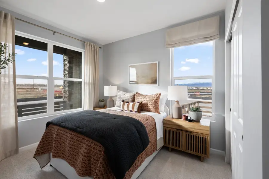 Furnished interior in a model home at Cordovan in Firestone (Image 10).