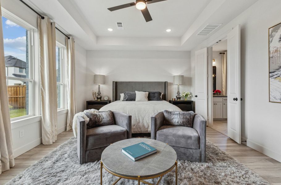 Furnished interior in a model home at Windsong Ranch in Prosper (Image 40).