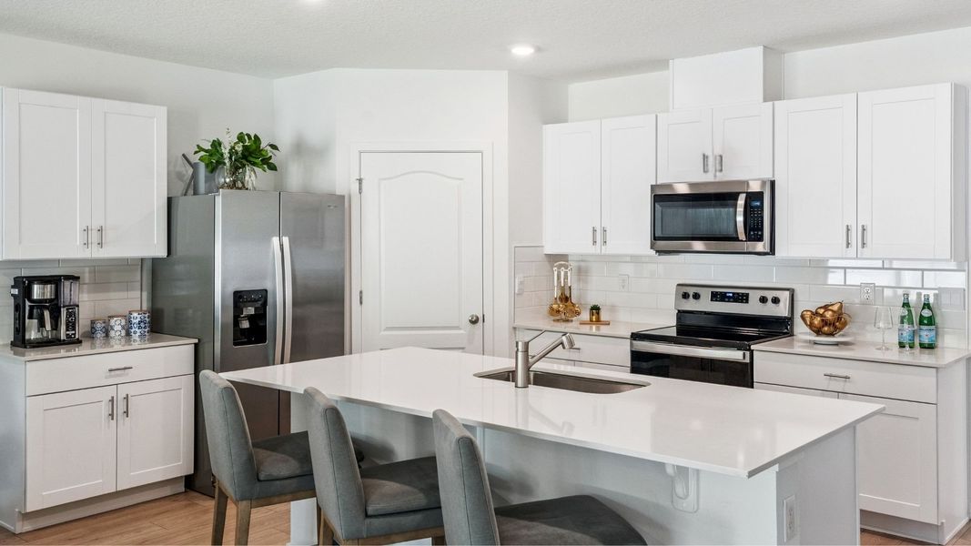 Furnished interior in a model home at Wynwood in Ocoee (Image 10).