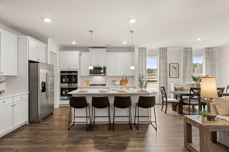 Furnished interior in a model home at Westland in Bogart (Image 5).