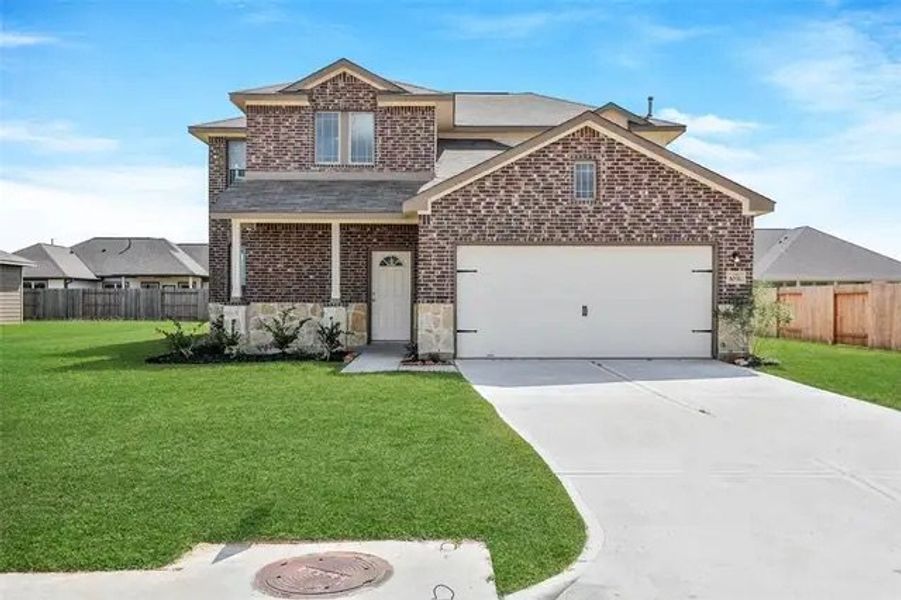 Front exterior of a home in the Clear View Estates community, located in Willis, TX (Image 6).