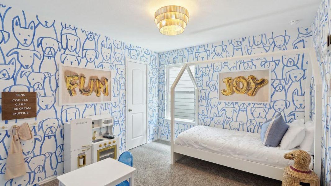 Furnished interior in a model home at Grand Pines in Magnolia (Image 18).