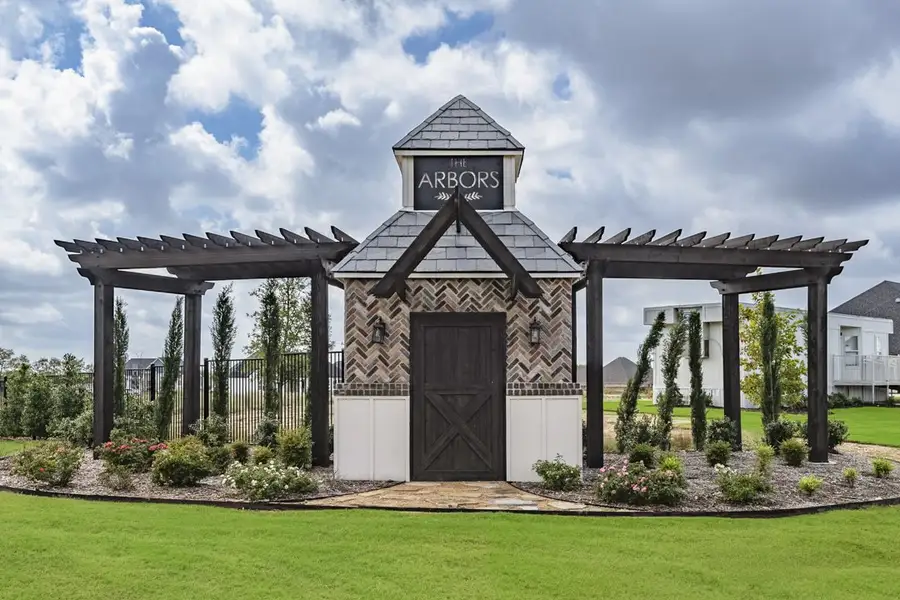 Entrance to the The Arbors Midlothian community in Midlothian, TX, featuring signage and landscaping (Image 2). Entrance to the The Arbors Midlothian community in Midlothian, TX, featuring signage and landscaping (Image 2).