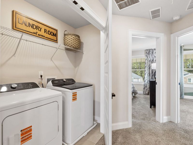 Laundry day can be a breeze with storage shelving to organize your cleaning essentials.