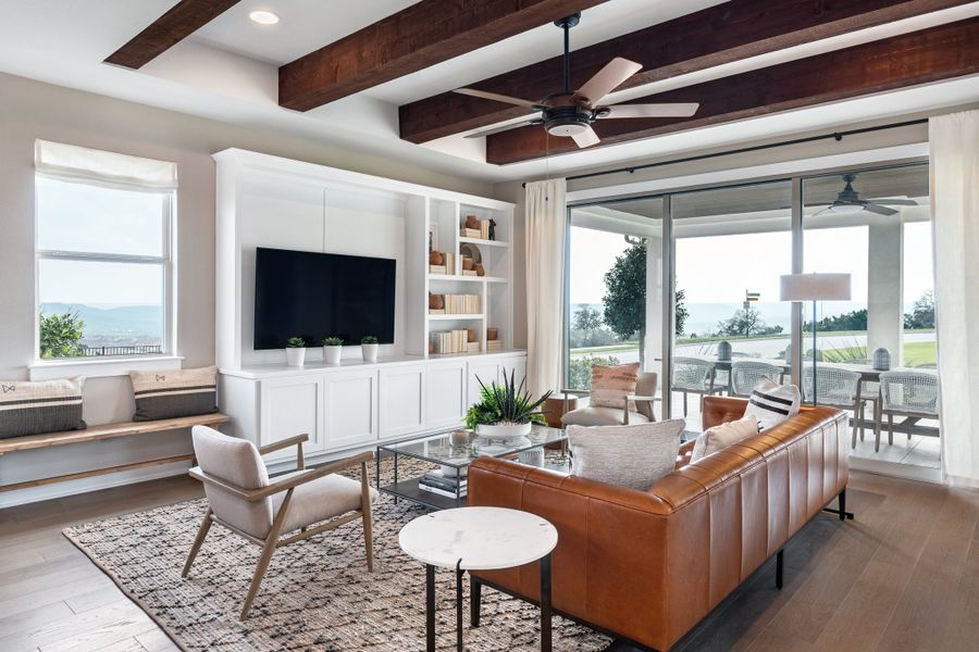 Furnished interior in a model home at Travisso Capri in Leander (Image 10).