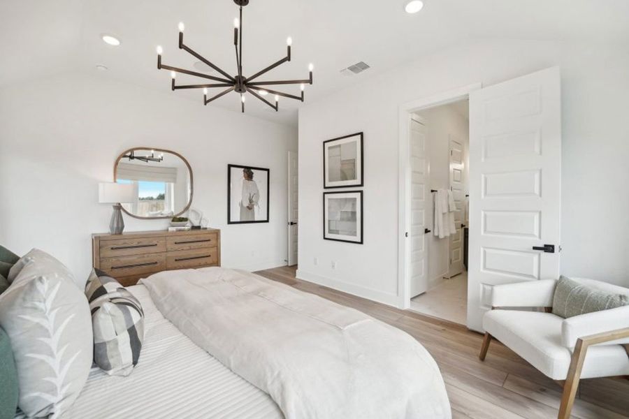 Furnished interior in a model home at Grande Estates in Bertram (Image 5).