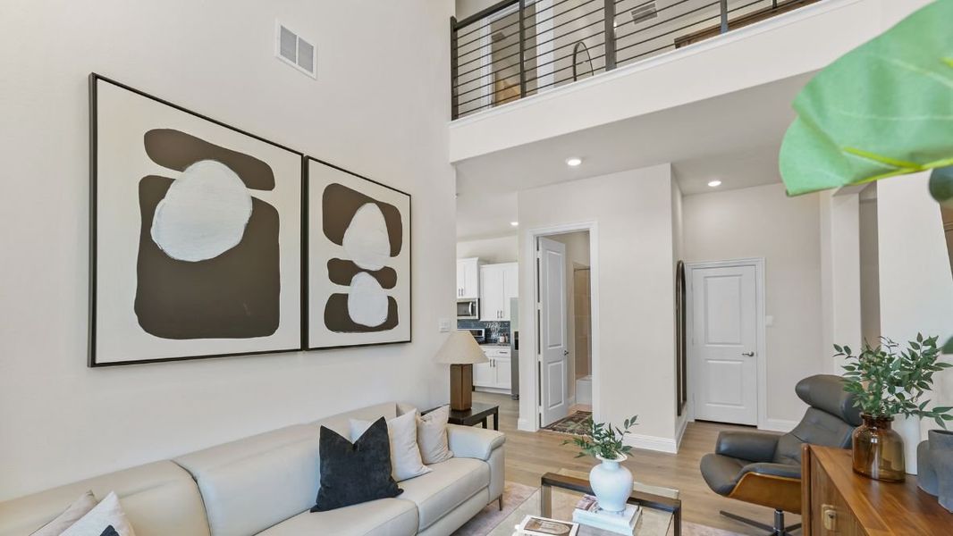 Furnished interior in a model home at Mustang Square in Plano (Image 5).