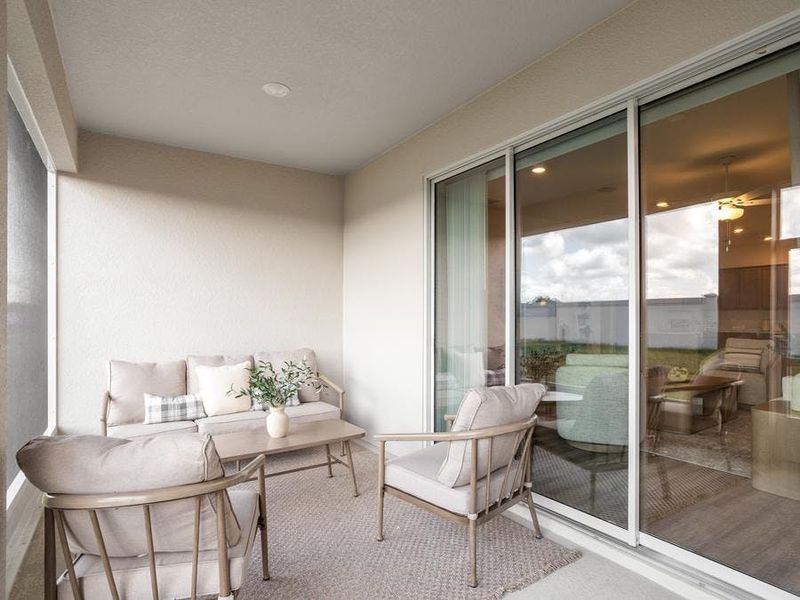 Your living space extends outdoors to your covered lanai - Summerlyn II model home in Auburndale, FL