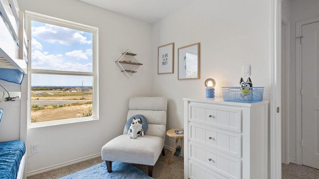 Furnished interior in a model home at Lucero in San Antonio (Image 26).