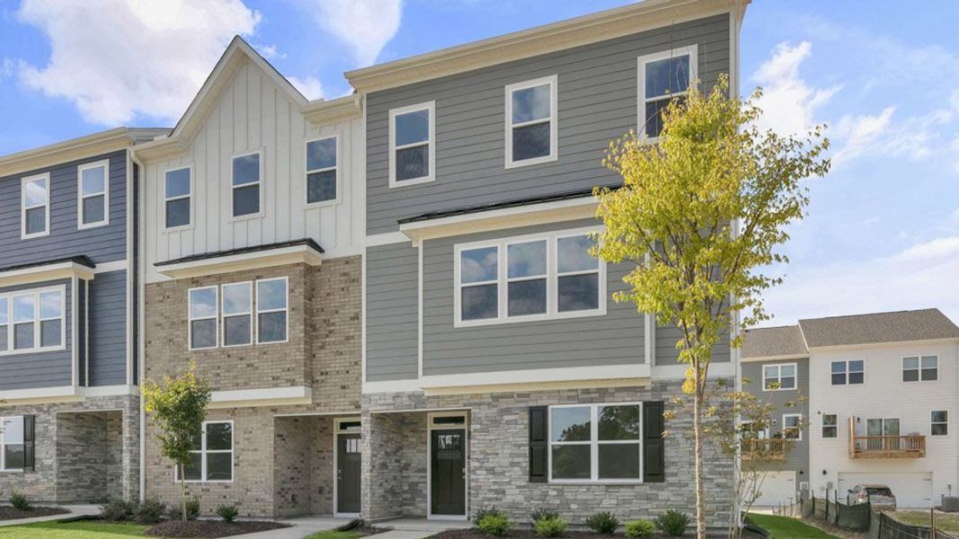 Front exterior of a home in the The Townes at Madden West community, located in Fuquay Varina, NC (Image 17).
