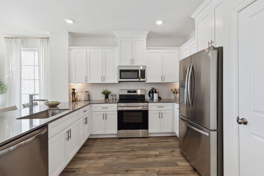 Furnished interior in a model home at Heritage Village in Haltom City (Image 26).