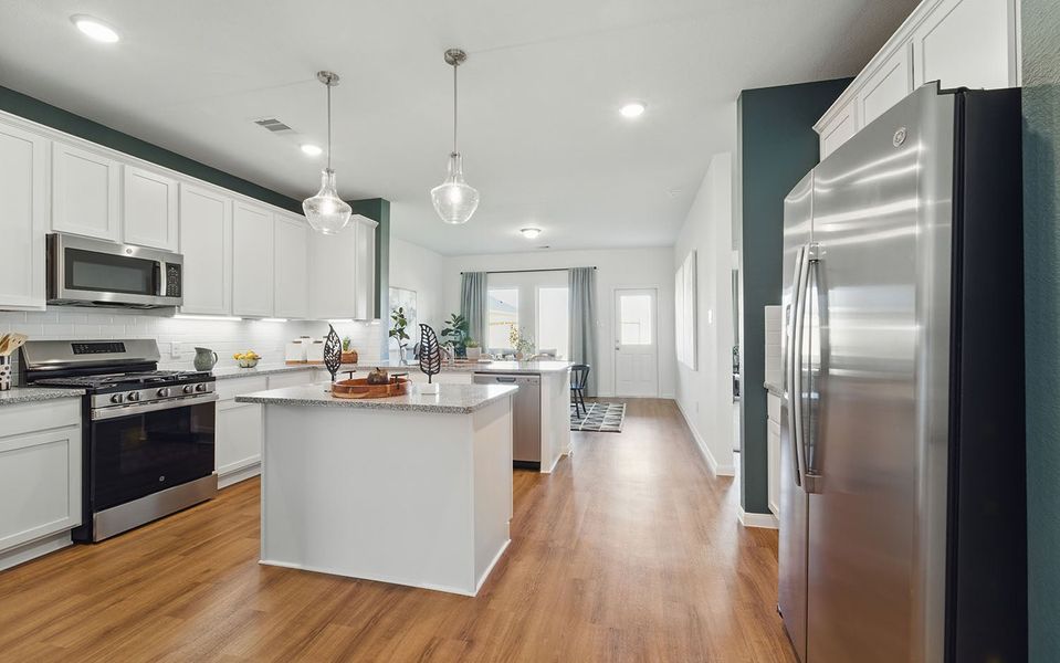 Furnished interior in a model home at Sweetgrass Village in Crosby (Image 9). Furnished interior in a model home at Sweetgrass Village in Crosby (Image 9).